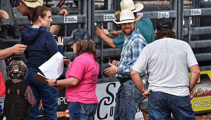 Mineral Wells Vice President, Cole Vaughan helping with the Palo Pinto rodeo.